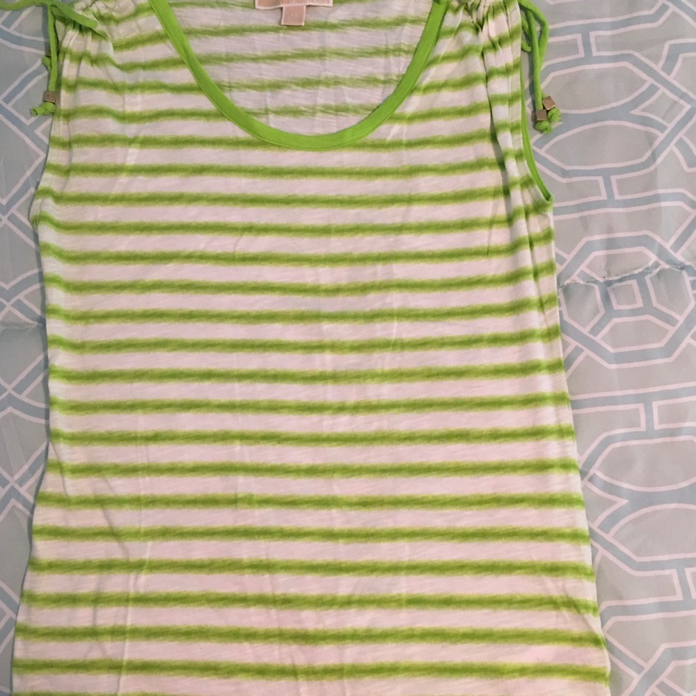 Striped MK tee with open shoulder details.
